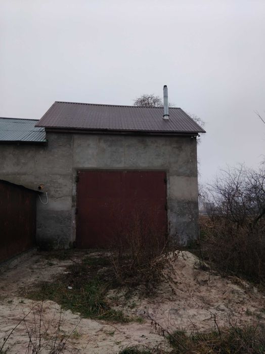Продам двухповерховий універсальный гараж.