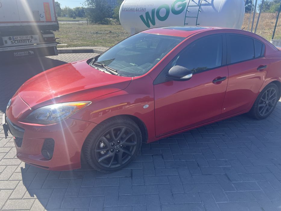 Мазда 3 комплектация топ