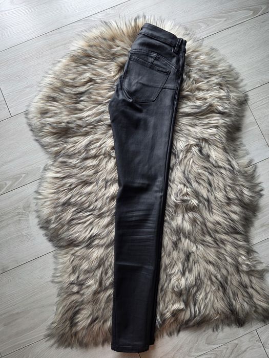 Woskowane spodnie Mango rozm. 32 push-up