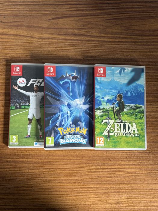 Nintendo Switch Lite + Jogos e Acessórios (como nova)