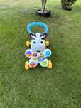 Chodzik jeździk fisher price