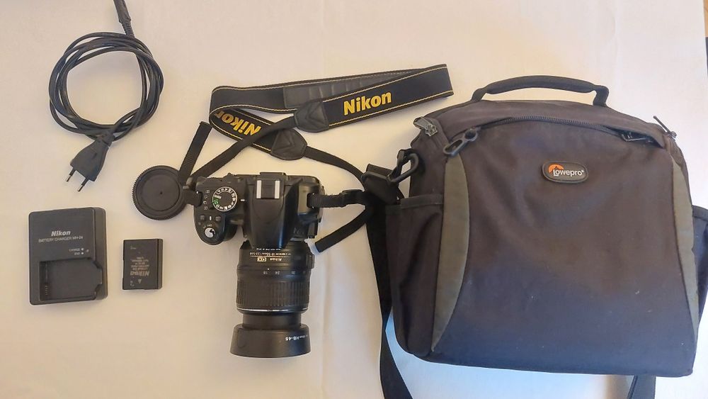 Nikon D3100 + objectiva + mala lowepro