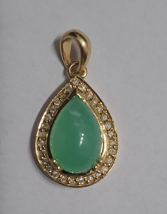 Zawieszka złota zbrylantami.