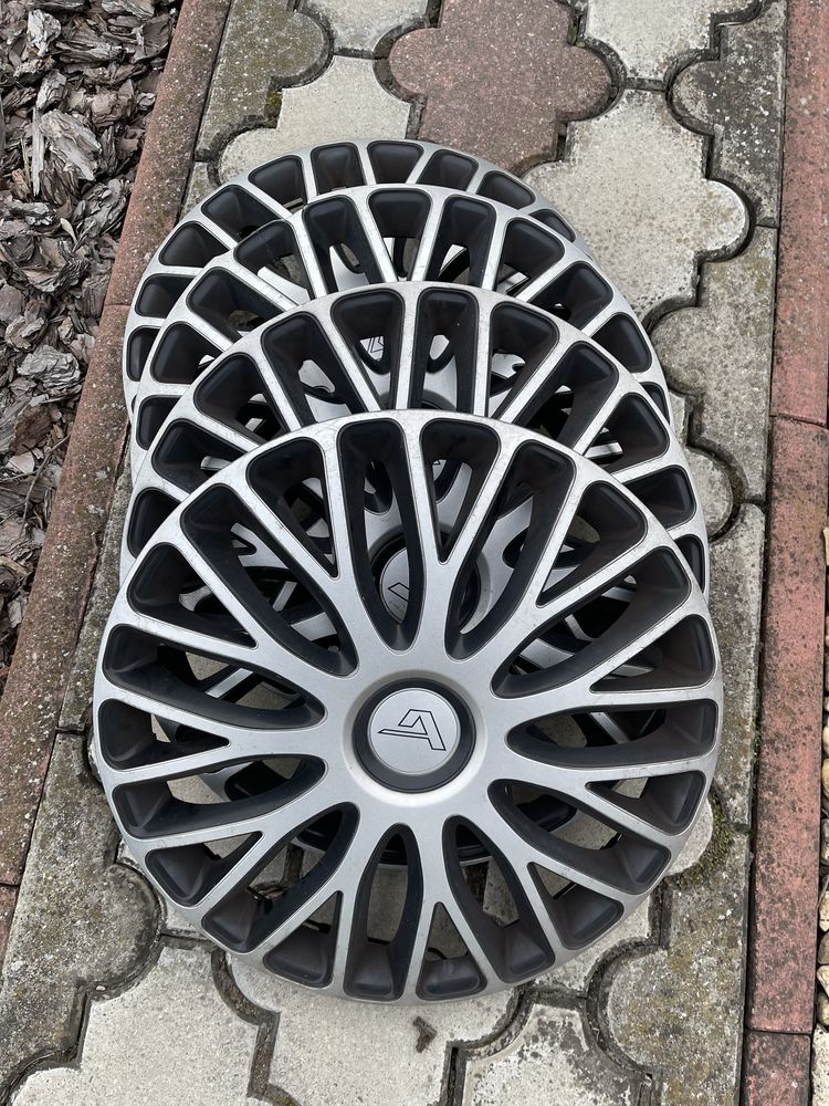 Felgi stalowe 5x100 z oponami zimowymi 185/60 R15  Audi Seat Skoda VW