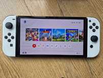 Nintendo Switch Oled - bogaty zestaw: gry, etui, dodatkowy pad