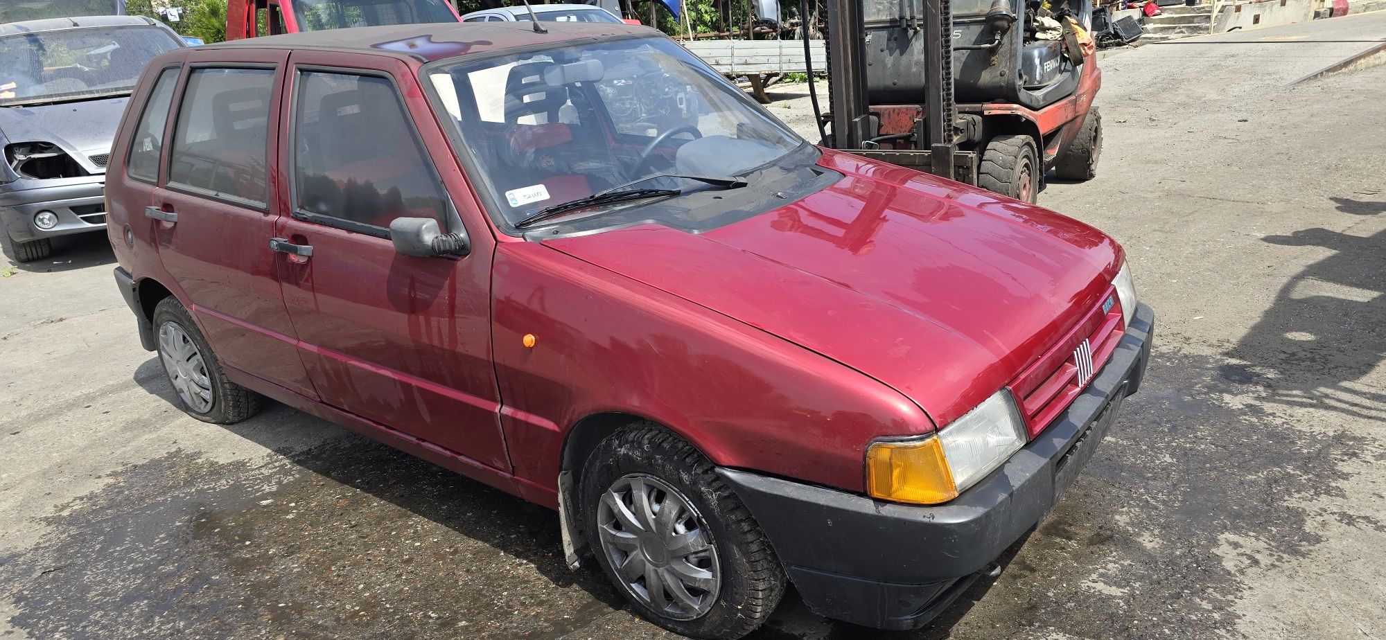 Drzwi maska klapa  zderzak lampa silnik 0.9 Fiat  Uno części