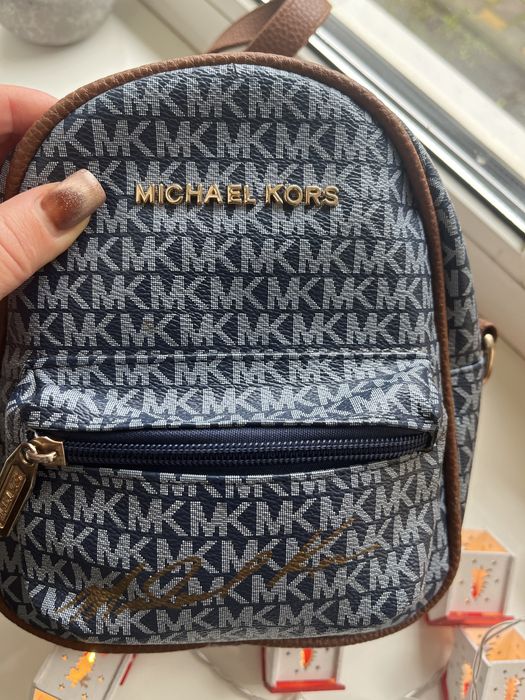 Рюкзак Michael Kors та різні сумки