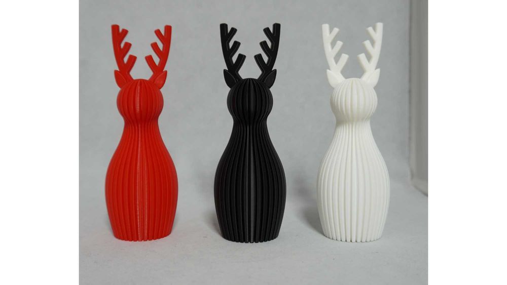 Набір з 3 новорічних фігурок оленів (чорний, білий, червоний)