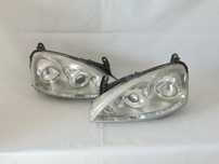 ORYGINAŁ lampa przednia przód lewa prawa soczewka Opel Corsa C FL lift 03-06r EUROPA