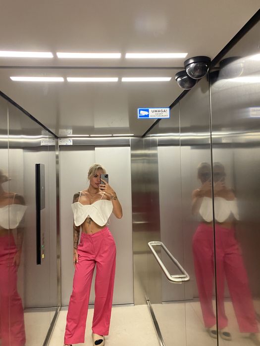 Rozowe eleganckie lub codziennie spodnie