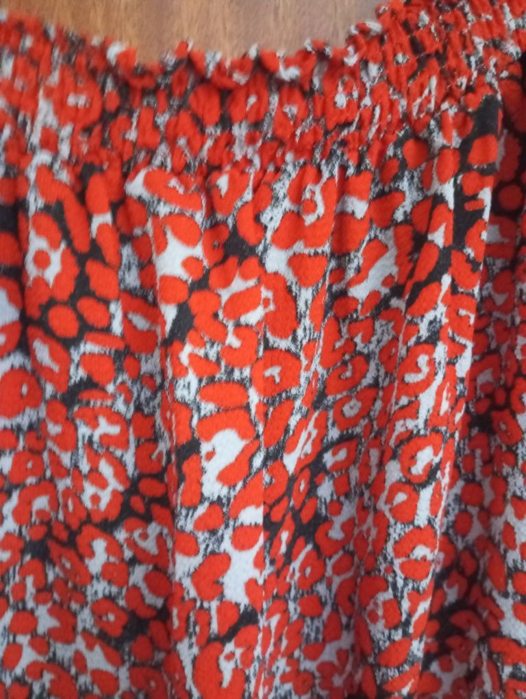 Macacão em tom vermelho