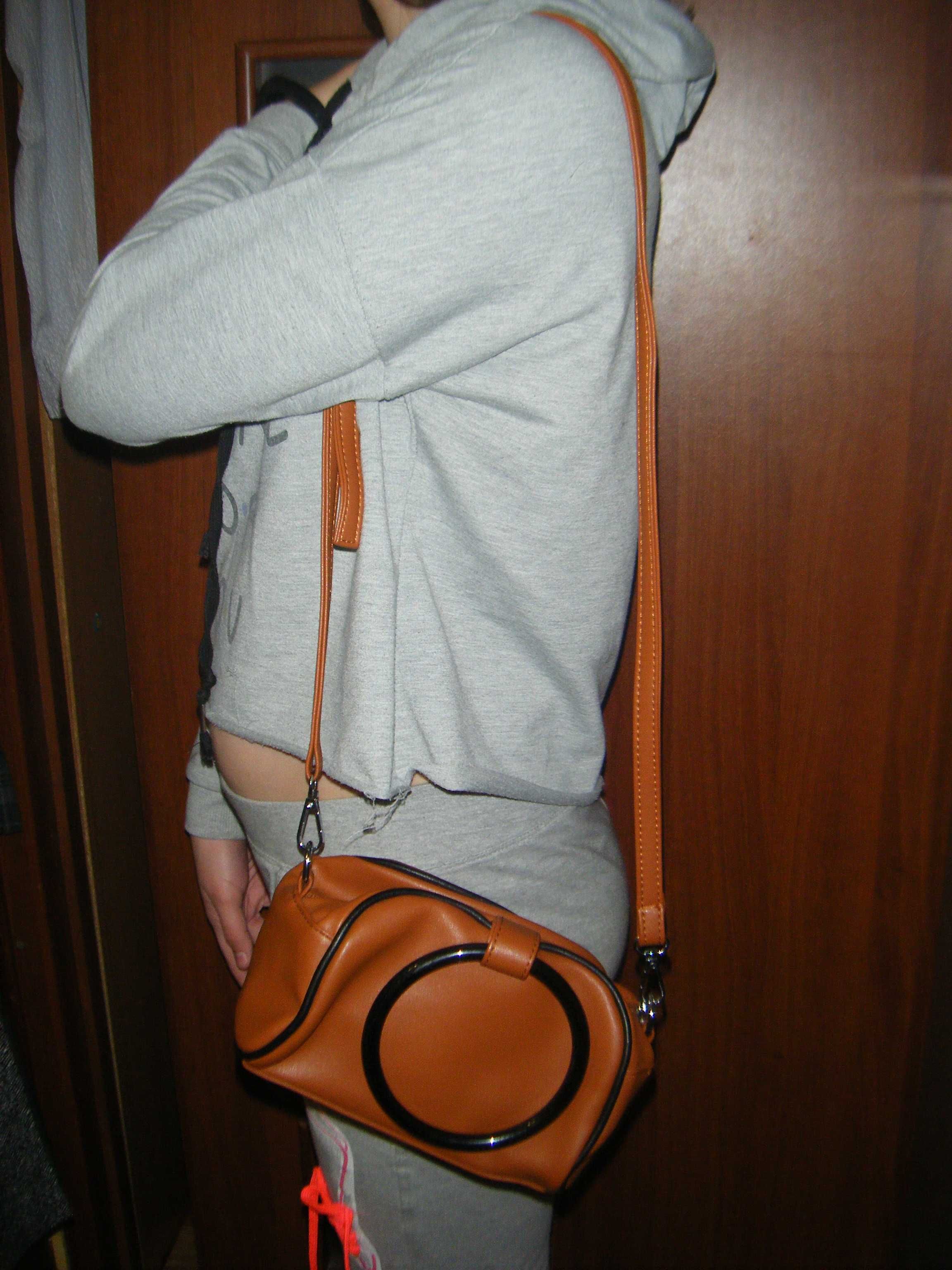 НОВАЯ Оригинальная сумочка с круглой ручкой на длинном ремне