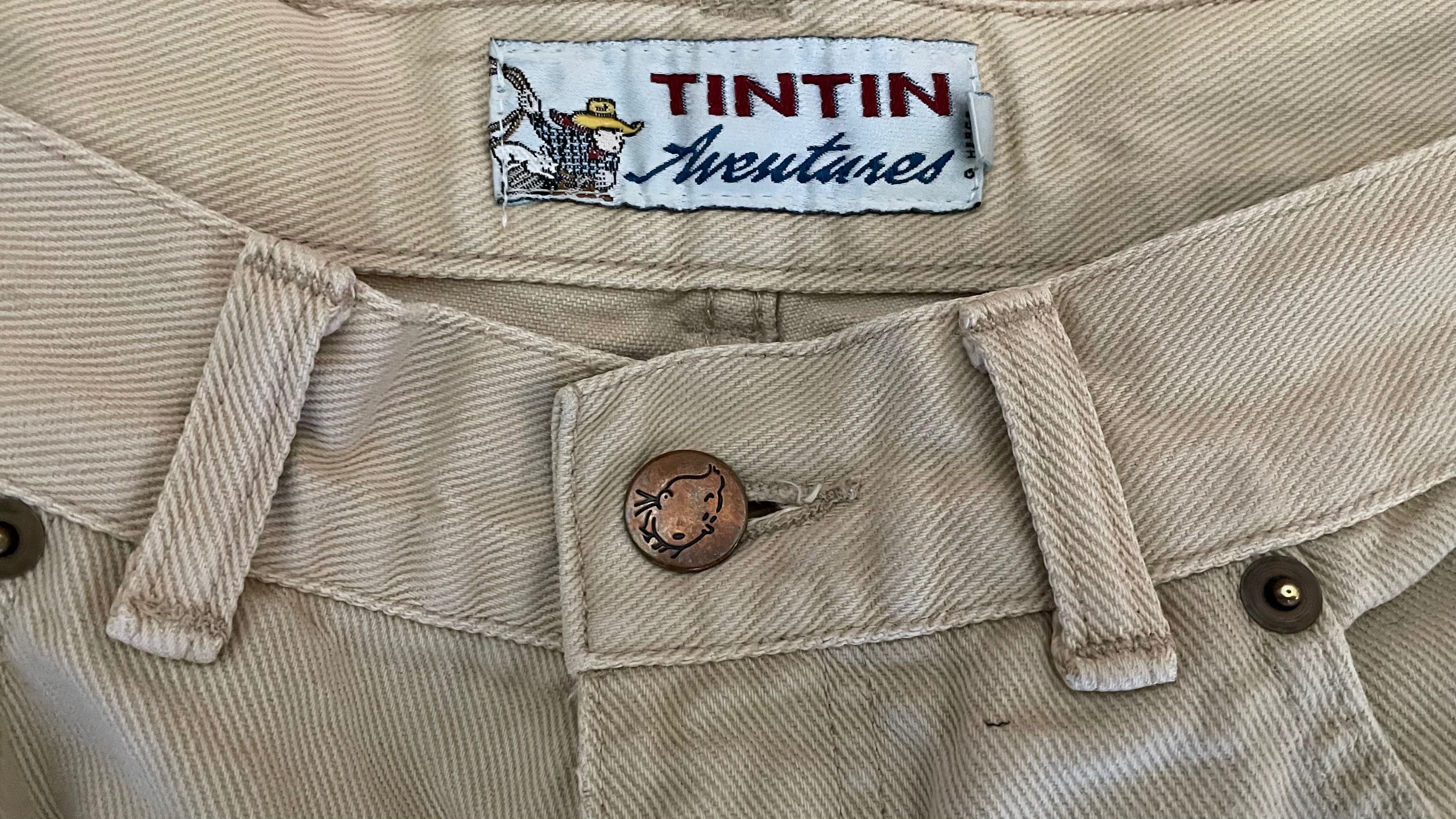Calças jeans roupa de homem Armani Jeans e Tintim e Milou Aventura