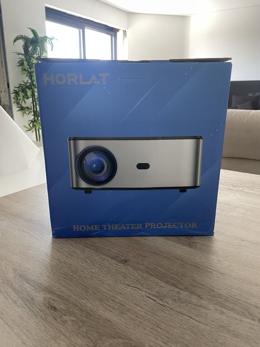 Projetor horlot dentro da caixa