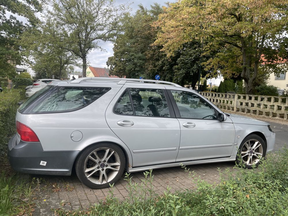 Saab 95 kombi skóra