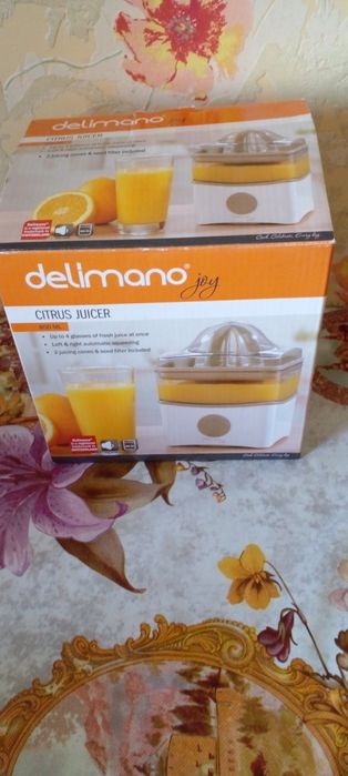 Электрическая соковыжималка delimano joy