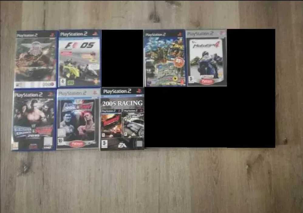 PS2 + 2 comandos + 8 jogos, NFS Most Wanted, Burnout, MotoGP, WWE, F1,