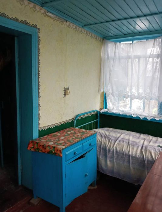 Ділянка з будинком