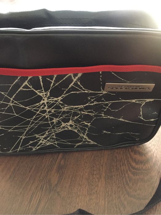 Saco na cor preta! Com uma alça