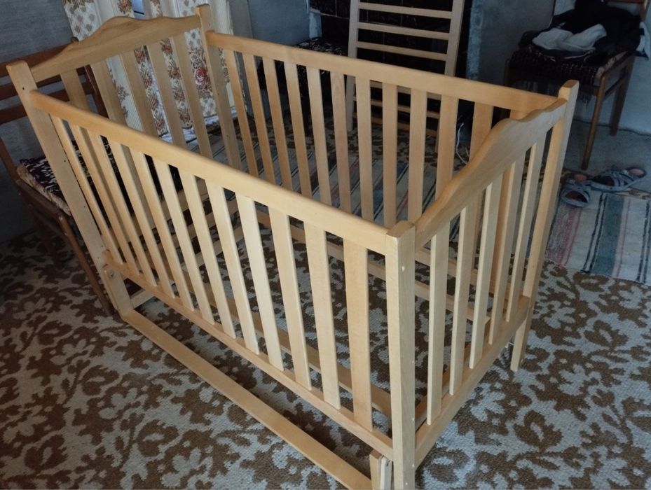 Ліжечко з маятником для дитини від народження до 4 років