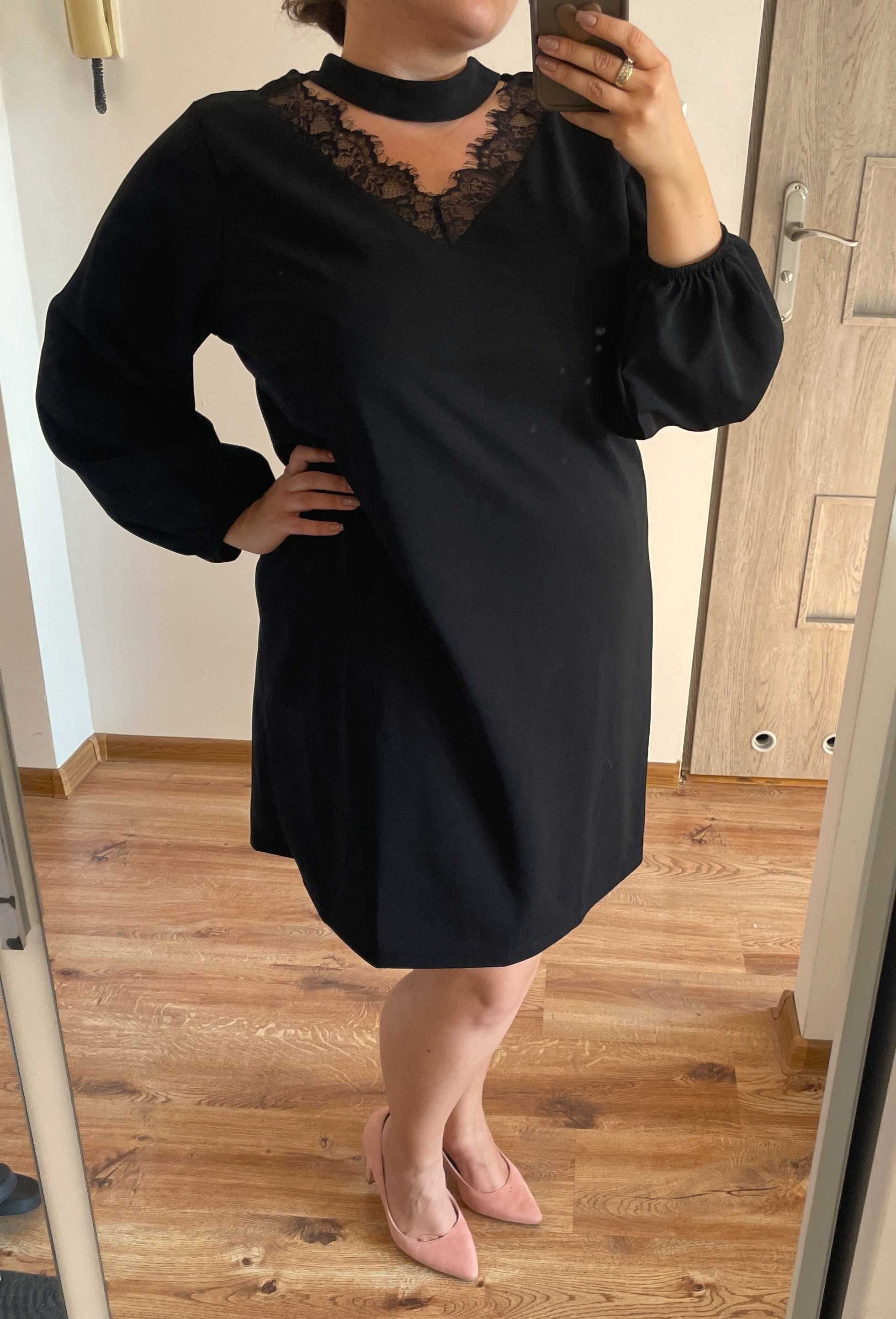Elegancka sukienka plus size w literkę A trapezowa 548 4xl