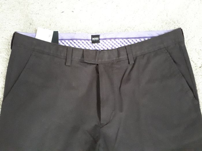 Nowe oryginalne spodnie Hugo Boss D-72555 Metzingen 52 z metkami