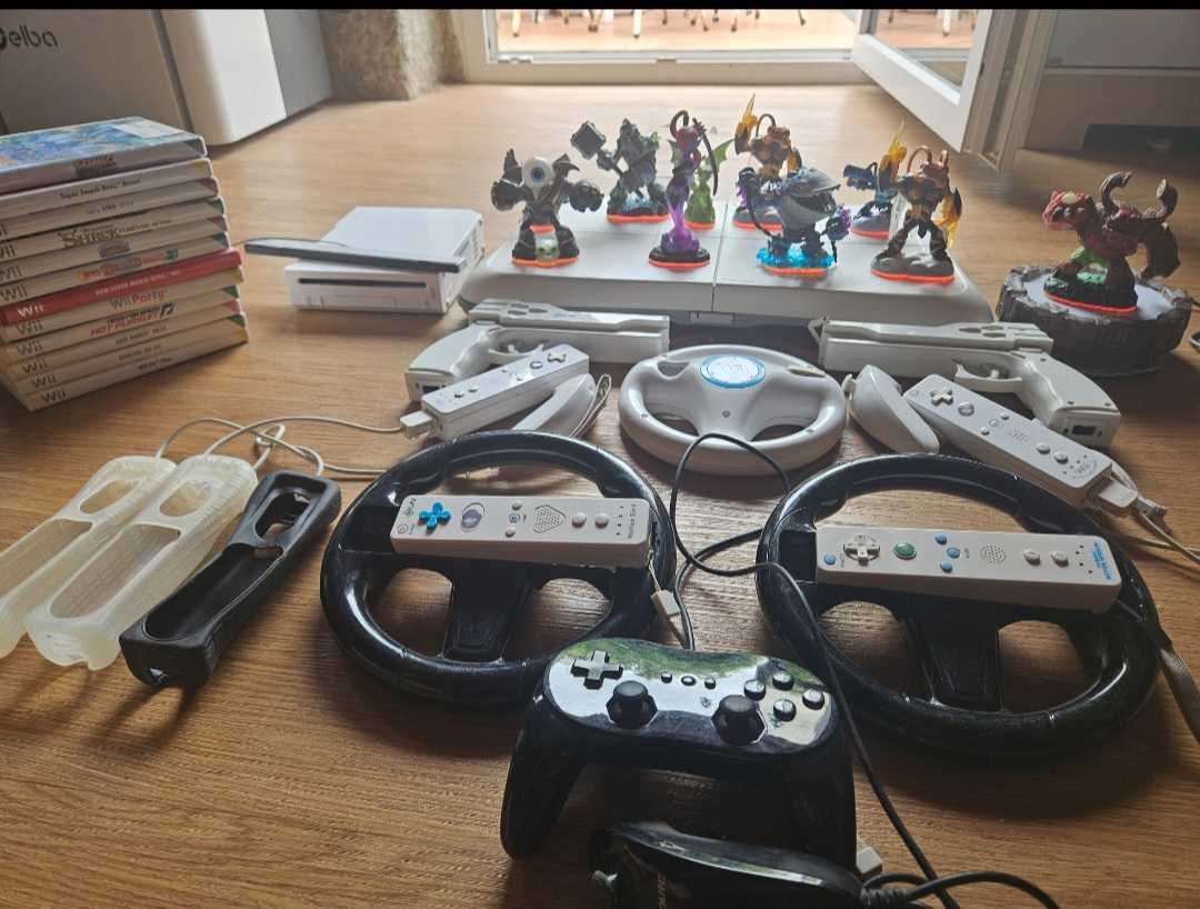 Nintendo wii + jogos + bonecos + controlos