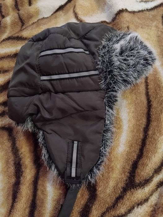 Продам ушанку,верх непромокний,дуже тепленька.