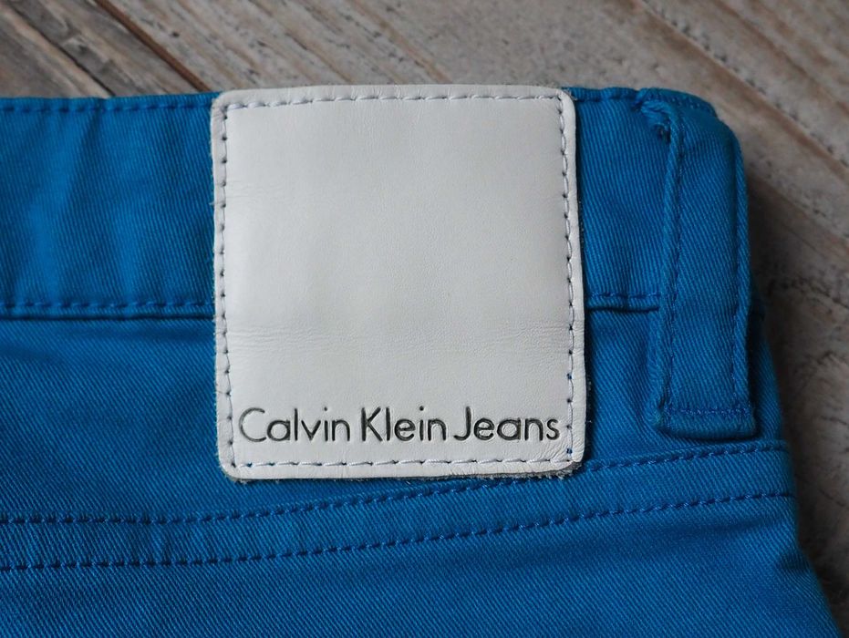 Calvin Klein_low rise_jeansy niebieskie_rozmiar 32