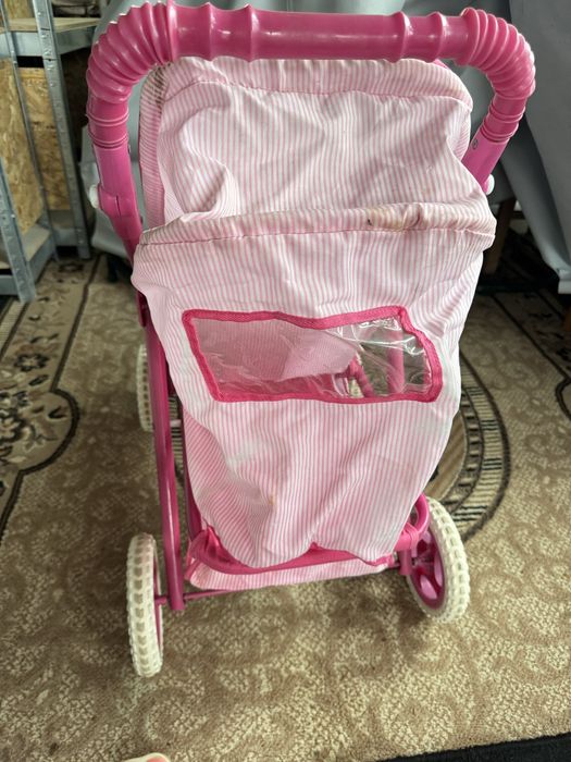 Дитяча коляска іграшкова