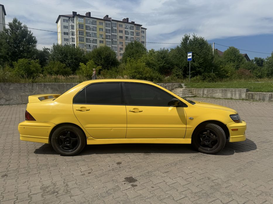 Продам Mitsubishi Lancer 2002