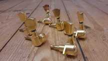 Afinadores dourados para guitarra eléctrica
