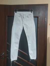 Jeansy dżinsy spodnie z rozdarciami elastyczne bawełniane do kostek 36