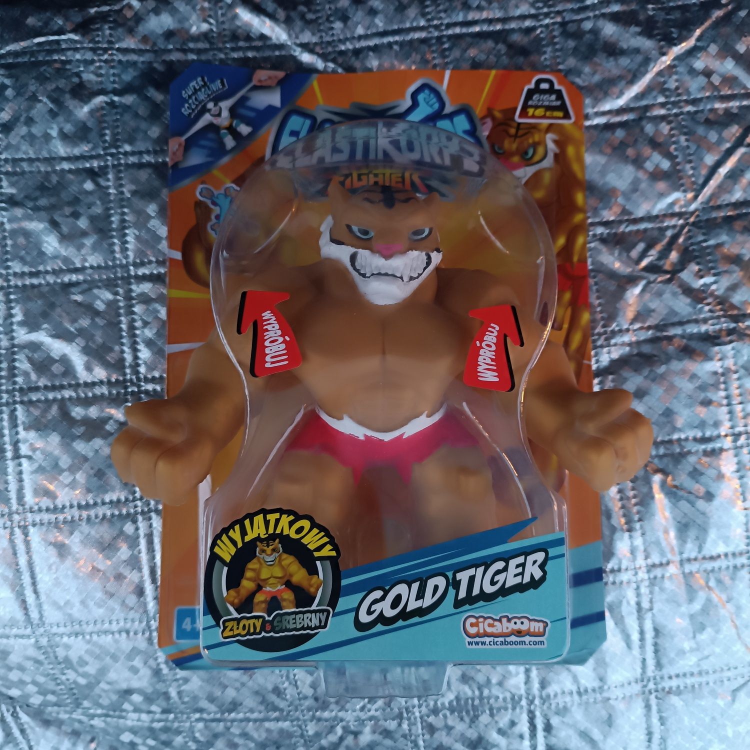 Elastikorps Fighter gumostwor Gold Tiger