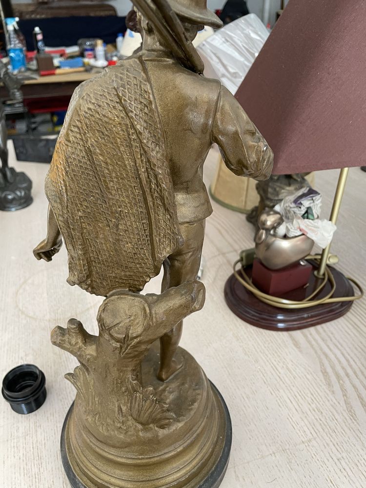 Estatueta de pescador