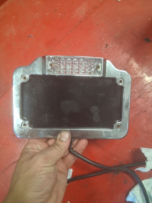 Suporte lateral para matrícula