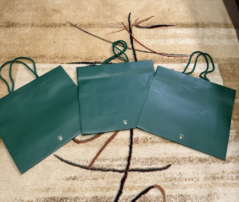 Брендові пакети, коробки, пакування, пильники.