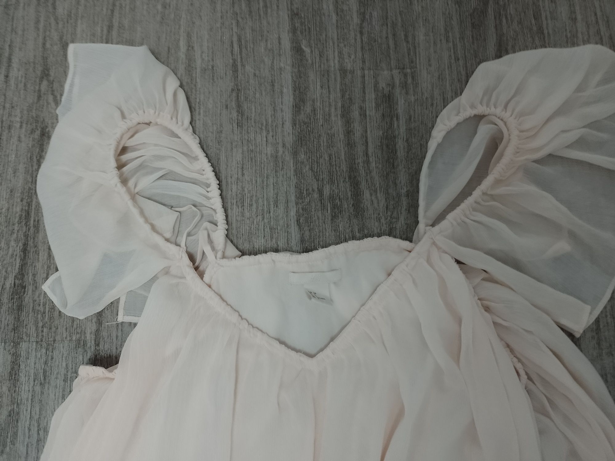 Sprzedam damską bluzkę rozmiar 34 firmy H&M.