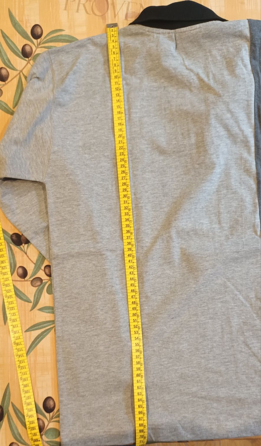 Polo de manga comprida e fecho
