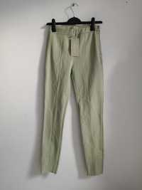 Nowe oliwkowe spodnie z Eco skóry roz 34 Amisu