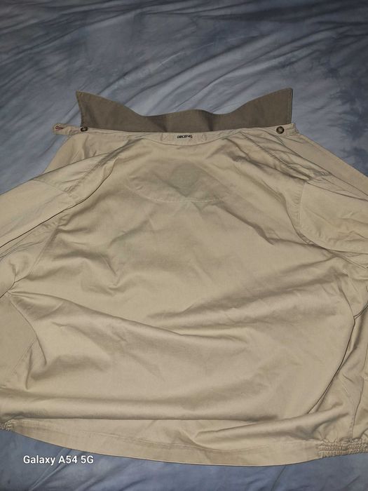 Casaco decenio como novo