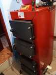 Kociol grzewczy „Optima komfort plus 15” . 15-18 Kw