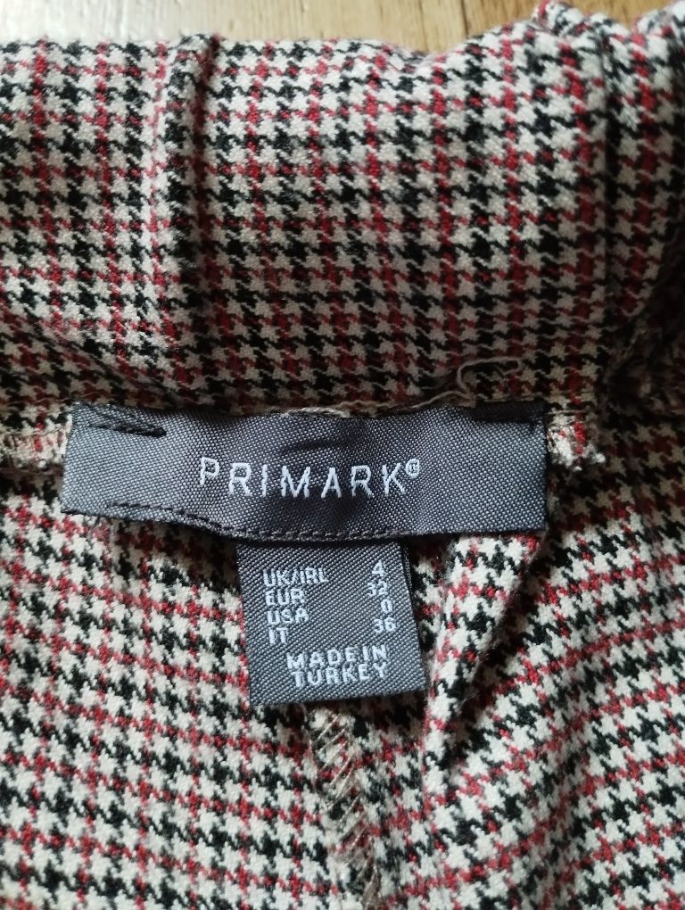 Primark 32 152/158 materiałowe spodnie w kartę lampas guma kieszenie