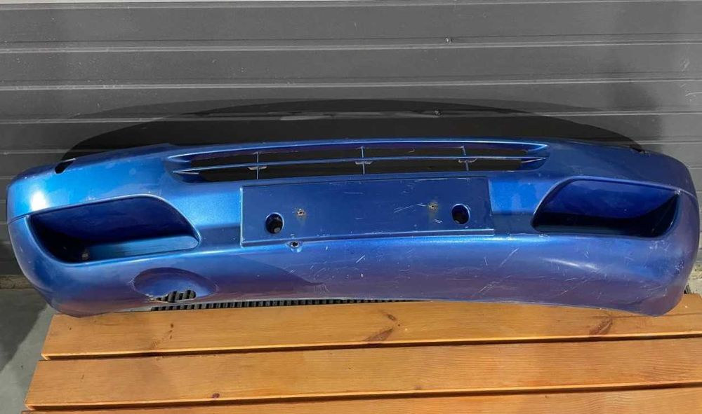 бампери задні передні