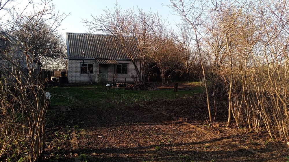 Продам земельну ділянку з будинком