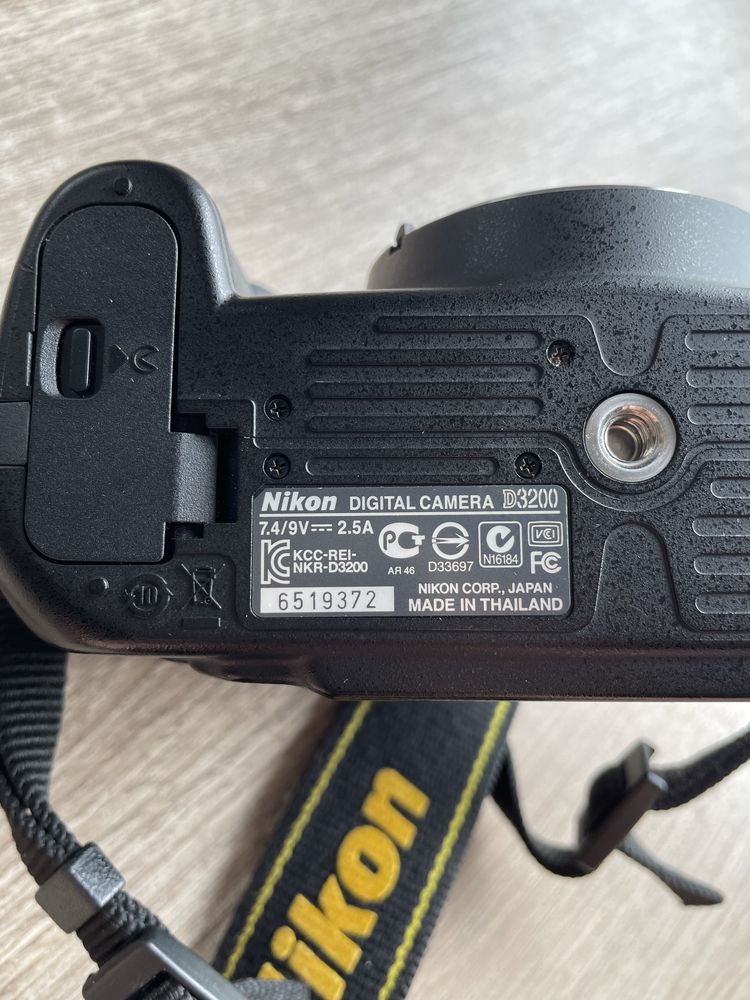 Set of Nikon D3200 photo camera with cable, charger, memory card, etc