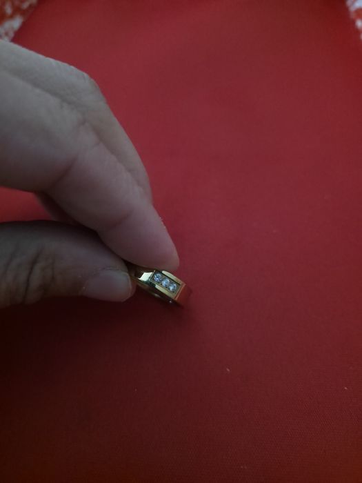 Aliança de aço dourada