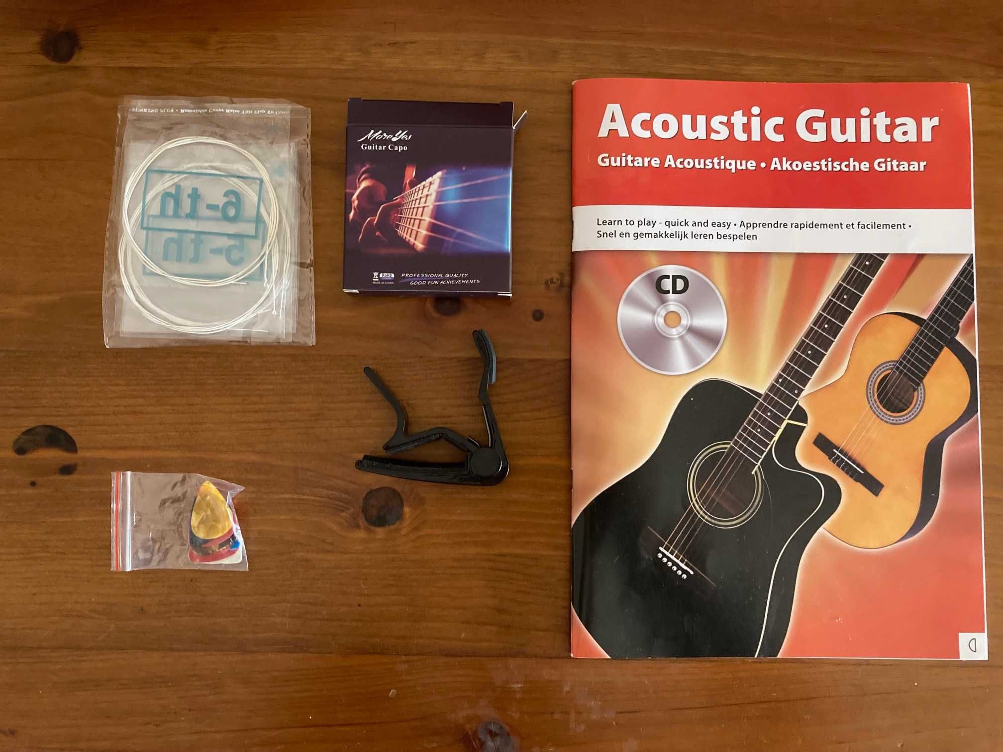 1 Guitarra e 1 Ukelele (dois instrumentos e acessorios)