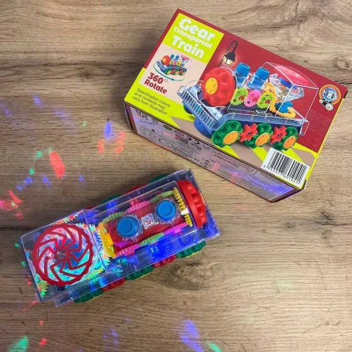 Дитячий інтерактивний прозорий поїзд зі світлом, музикою та поворотом