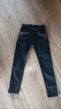 Spodnie jeansowe czarne 134 z ćwiekami dla dziewczynki